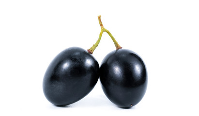Grape isolated on white background. One berry. Dark grape. Blue grape.