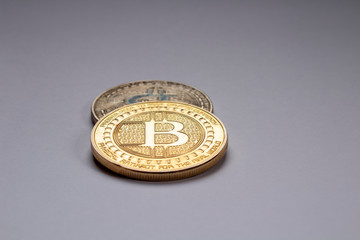 close up of bitcoin on a grey background