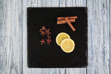 cinnamon sticks, star anise and lemon