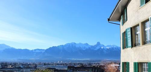 View of snowy mountains in winter at Thun. Thun is a town in the canton of Bern in Switzerland.
