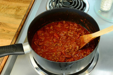 Spicy Homemade Chili Sizzling in Sauce Pan