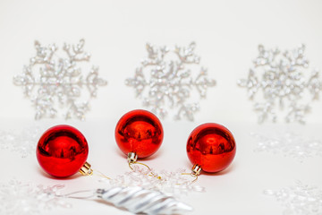 Christmas decorations in red on a light background
