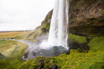Fototapeta na wymiar Beautiful Seljalandsfoss waterfall falling in pool, scenic, Iceland