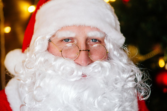 Close-up potrrait of Sanata Claus on Christmas backlground