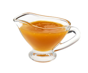Sweet and sour sauce  in glass bowl on white background
