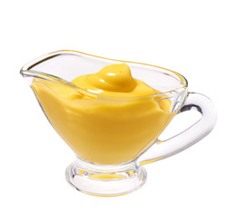 Сheese sauce  in glass bowl on white background