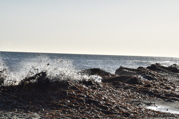 waves breaking on the rocks