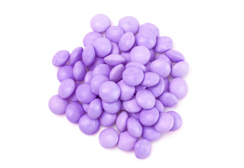 Pile of Candy Coated Chocolate Gems on a White Background