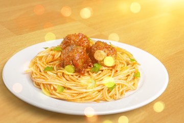 pasta with meatballs and parsley with tomato sauce