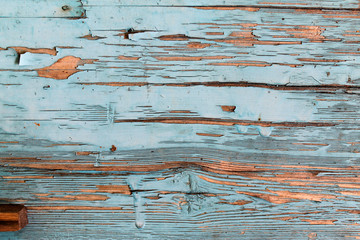 Old wooden texture with peeling paint , Old wooden background with remains of pieces of scraps of...