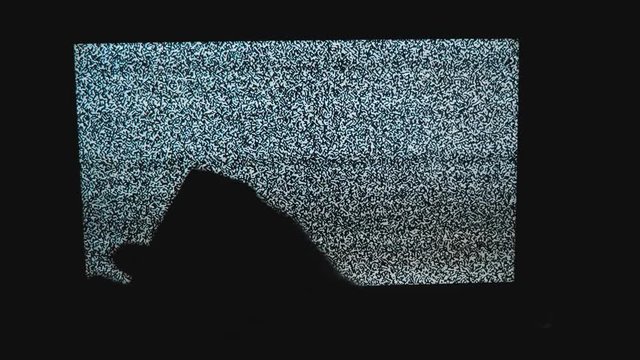 hand switches channels no man noise tv background. Television screen with static noise caused by bad signal reception. Television screen with static noise caused by bad signal reception . Noise