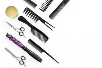 Set of professional hairdresser tools with combs white background top view mock up