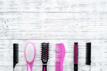 combs for hairdresser hairdresser on gray wooden background top view space for tqxt