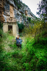 Naklejka na ściany i meble Mother and son walking, Greece