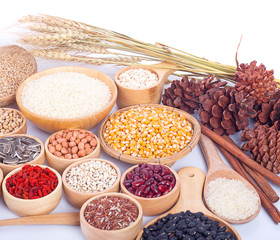 Cereal grains , seeds, beans on wooden background
