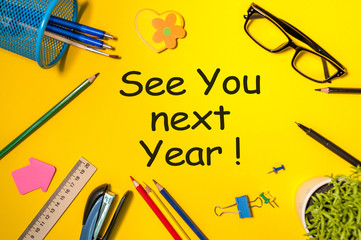 See you next year - memo at yellow office table. 2019 new year coming