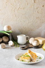 Béchamel baked pancakes stuffed with mushrooms