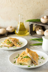 Béchamel baked pancakes stuffed with mushrooms
