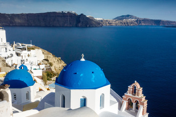 View of Church with seascape and mountain; Santorini island; Greece