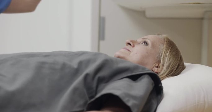 Magnetic Resonance Test on an Old Woman at Hospital