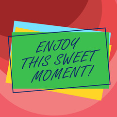 Handwriting text Enjoy This Sweet Moment. Concept meaning encouraging someone to love his life timeline Pile of Blank Rectangular Outlined Different Color Construction Paper