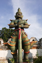 Giant statue In front of the temple of Thailand
