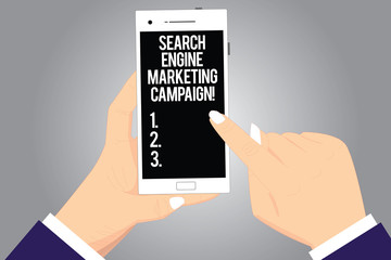 Handwriting text writing Search Engine Marketing Campaign. Concept meaning Advertising promotion optimization Hu analysis Hands Holding Pointing Touching Smartphone Blank Color Screen