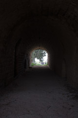 a pedestrian tunnel under an old fortress