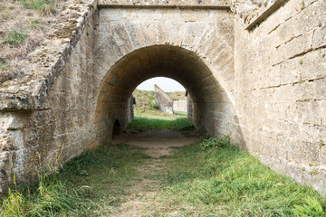 Fototapeta na wymiar a pedestrian tunnel under an old fortress