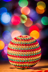 Christmas ball with colorfull bokeh