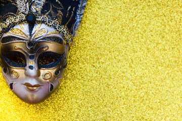 venice carnival mask on golden background