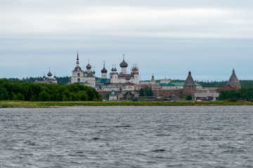 Fototapeta premium View on Solovetsky Monastery from the Bay of well-being, Russia. Solovetsky Monastery is on the UNESCO's World Heritage List. Solovki Islands, Arkhangelsk region, White Sea.