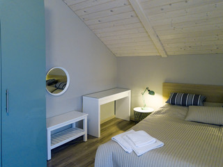 bedroom with wooden ceiling