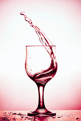 wineglass celebrate celebration isolated splashing, copy space