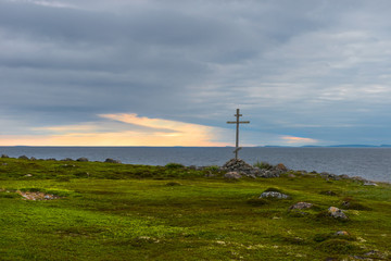 Fototapeta na wymiar Poklonny cross by the sea on Bolshoy Zayatsky Island. Solovetsky archipelago, White sea, Russia