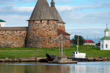 Spinning tower Spaso-Preobrazhensky Solovetsky Monastery in the summer from the Bay of well-being, Russia