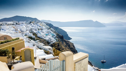 Seascape and classical white architecture of Oia town; Santorini island; Greece