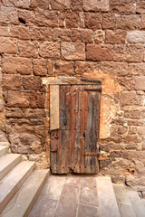 medieval door in a stone wall