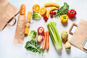 Paper bag and different healthy food.