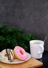 Pink Donuts on plate withe coffee