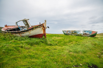 old fishing boats on the beach