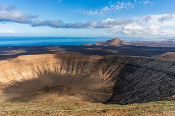 Caldera Blanca volcano in Lanzarote, Spain. View over an inactive volcanic crater.