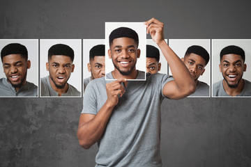 Concept of man choosing expression of face - obrazy, fototapety, plakaty