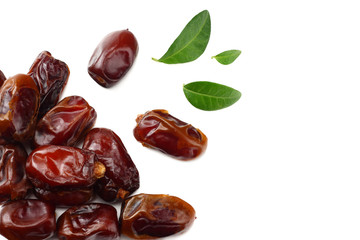 date fruits with green leaves isolated on white background. top view