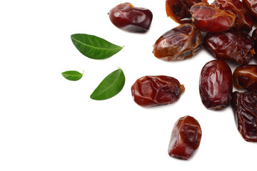 date fruits with green leaves isolated on white background. top view