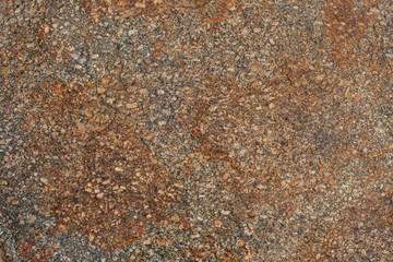 Grey granite stone texture with rusty spots