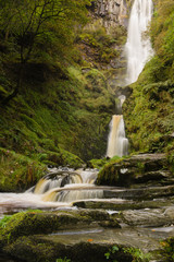 Obraz premium Pistyll Rhaeadr waterfall in Llanrhaeadr ym Mochnant Powys where the river Afon Disgynfa drops 240 feet also listed as one of the Seven Wonders of Wales