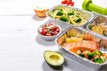 Healthy food delivery concept - meals in fossil containers, top view