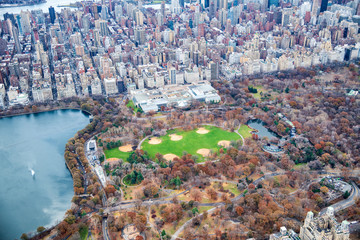 Metropolitan Museum Of Art and Central Park aerial view in autumn, New York City from helicopter