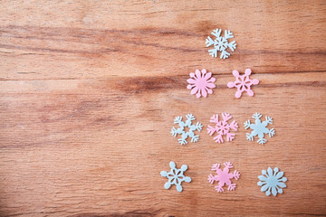 Snowflake on wood desk